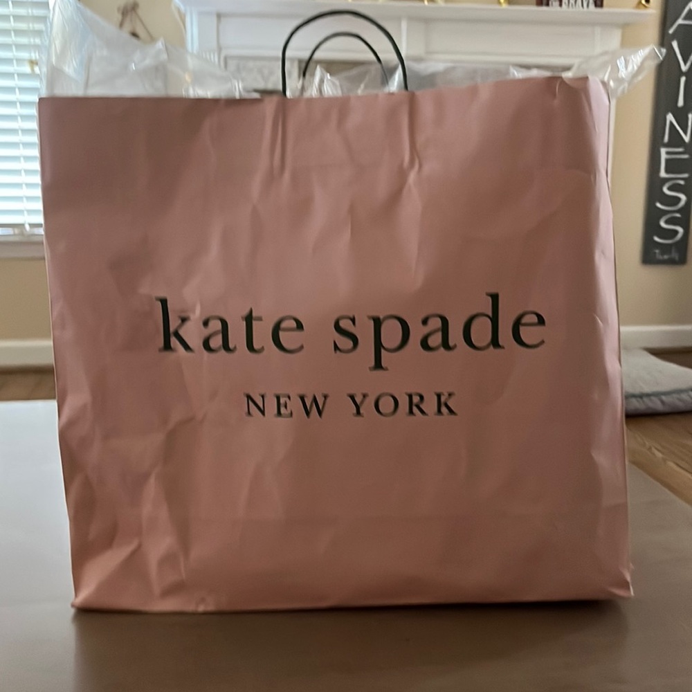 Kate Spade Tote, brand new, never used. Light pink with pineapple on front.